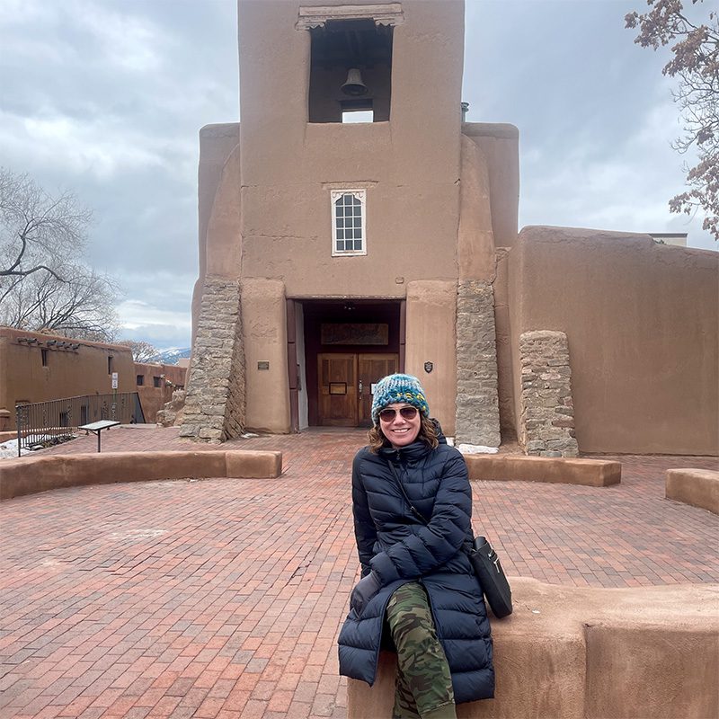 Yvette visiting San Miguel Chapel in the winter