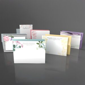 Set of stylish stationery notecards arranged neatly, featuring elegant designs on high-quality paper.