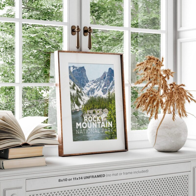 Rocky Mountain National Park Vintage Poster in frame by window