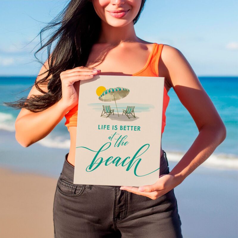 Woman holding Coastal Wall Decor Life is Better at the Beach