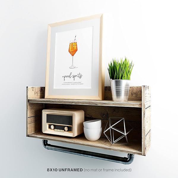 Aperol Spritz Cocktail Wall art shown in frame on decorative shelf with other accessories. (frame is not included)