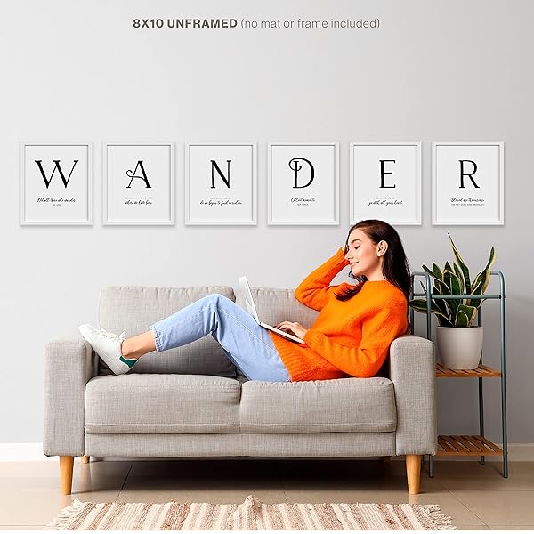 Wander Quote Wall Art Framed above woman on couch (frames not included)
